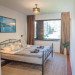 Bedroom with 160 cm double bed at Nine Pines, Rovaniemi