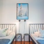 Bedroom with two single beds at Nine Pines, Rovaniemi