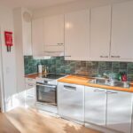Fully equipped kitchen at Nine Pines family apartment, Rovaniemi