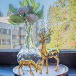 Window detail with reindeer figurines at Nine Pines